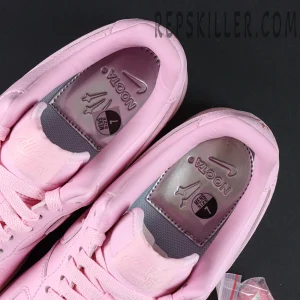 Overhead view of NOCTA x Nike Air Force 1 Low “Pink Foam” showing silver insoles with NOCTA branding.