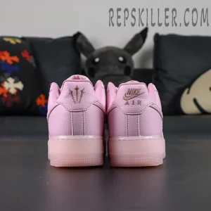 Rear view of NOCTA x Nike Air Force 1 “Pink Foam” showing embroidered Nike Air and NOCTA trident logos.