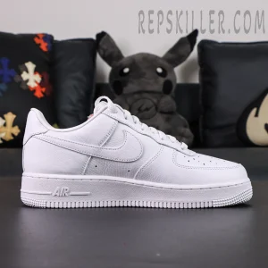 Side profile of NOCTA x Nike Air Force 1 “Certified Lover Boy” showing Swoosh logo and AIR branding on midsole.
