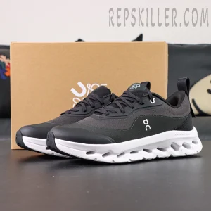 ON L × Cloudtilt 2 “Black” sneakers with box in background, featuring black upper and white sole.