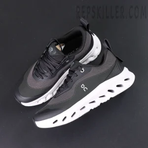 Top-down view of ON L × Cloudtilt 2 “Black” showing minimal design and On logo on side panel.