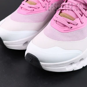 Close-up of ON L × Cloudtilt 2 “Pink White” toe box showing pink mesh upper and white rubberized guard.