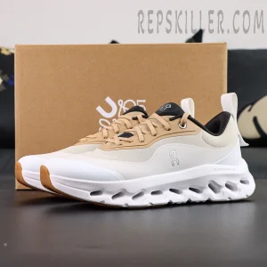 ON L × Cloudtilt 2 “Tan White” with box in background, highlighting minimalist design and neutral palette.