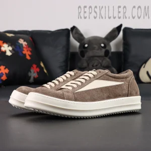 Angled front view of DRKSHDW Porterville Vintage Low “Dust Milk” showing contrast between taupe and cream tones.