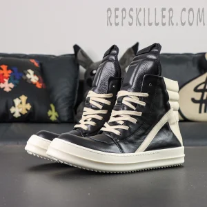 Side-angle shot of Porterville Geobasket ‘Black Milk’ showcasing black leather upper and cream accents.
