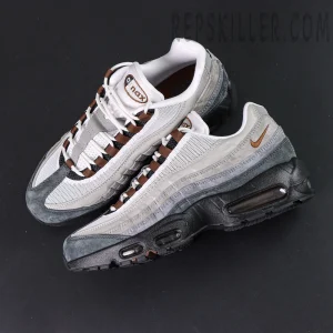 Pair of Nike SB x Air Max 95 “Cacao Wow” displayed together highlighting the brown and grey color palette.
