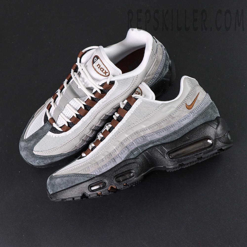 Pair of Nike SB x Air Max 95 “Cacao Wow” displayed together highlighting the brown and grey color palette.
