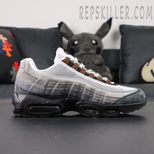 Side profile of Nike SB x Air Max 95 “Cacao Wow” showing gradient grey suede upper with brown accents.