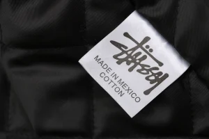 Stussy Earth Embroidery Leather Varsity Jacket Wash label