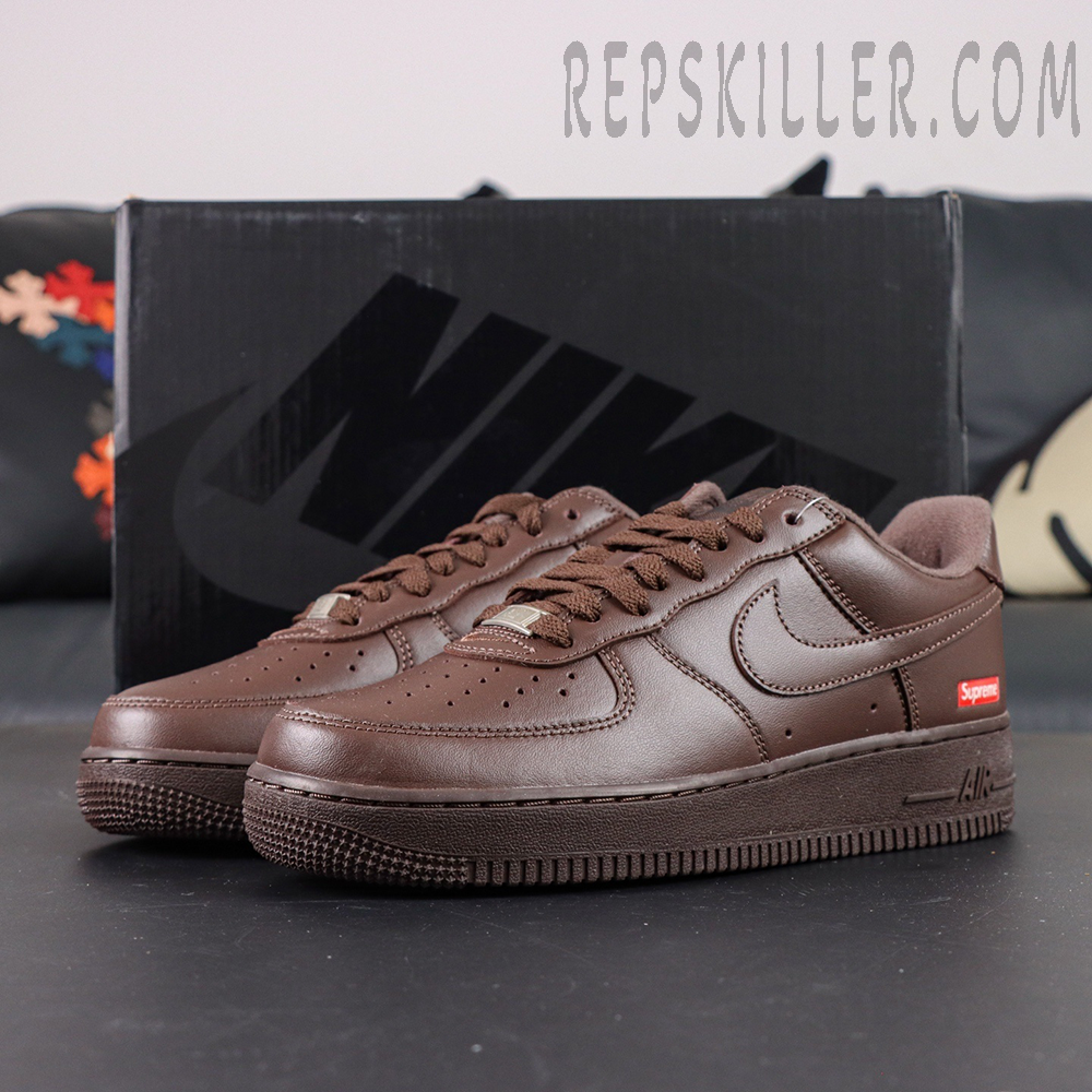 Sup x Air Force 1 Low SP ‘Box Logo - Baroque Brown’ with black Nike shoebox and red Supreme tag on heel