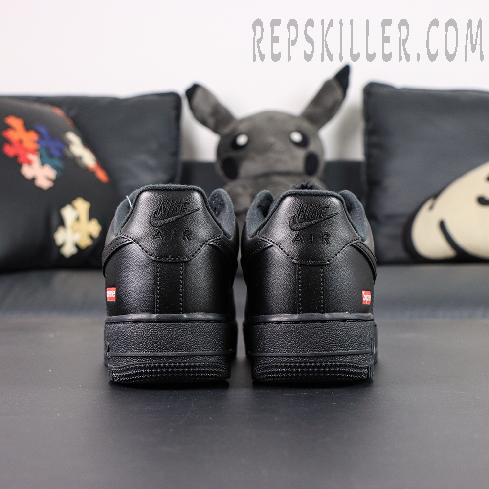 Rear heel view of Sup x Air Force 1 Low SP ‘Box Logo - Black’ with embossed Nike Air branding