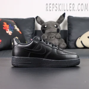 Side profile of Sup x Air Force 1 Low SP ‘Box Logo - Black’ featuring smooth black leather and tonal stitching