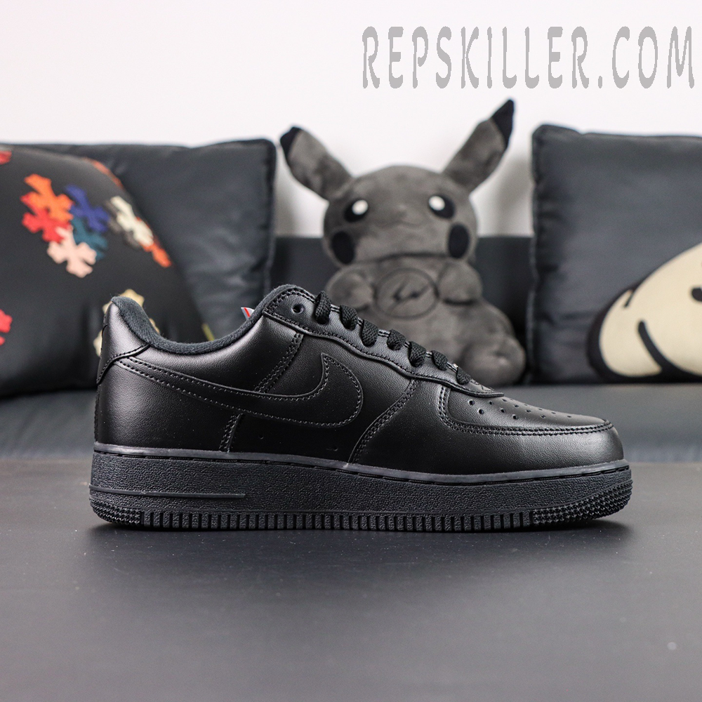 Side profile of Sup x Air Force 1 Low SP ‘Box Logo - Black’ featuring smooth black leather and tonal stitching