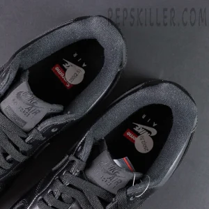 Top view of Sup x Air Force 1 Low SP ‘Box Logo - Black’ showing co-branded Nike Air and Supreme insoles
