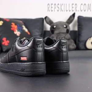 Back heel detail of Sup x Air Force 1 Low SP ‘Box Logo - Black’ with visible red Supreme box logo patch