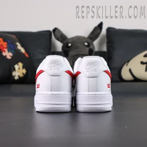 Rear heel view of Supreme x Nike Air Force 1 Low SP ‘Box Logo - Speed Red’ with Nike Air embroidery and red swoosh detail