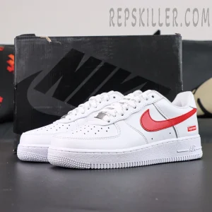 Supreme x Nike Air Force 1 Low SP ‘Box Logo - Speed Red’ displayed with black Nike shoebox background