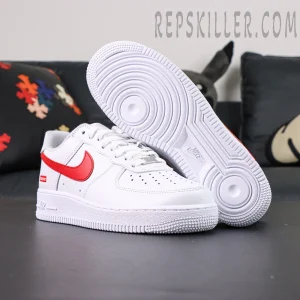 Bottom view of Supreme x Nike Air Force 1 Low SP ‘Box Logo - Speed Red’ showing outsole traction pattern and logo detail