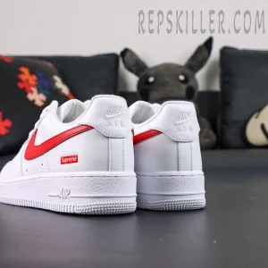 Angled rear shot of Supreme x Nike Air Force 1 Low SP ‘Box Logo - Speed Red’ showing dual branding and heel structure