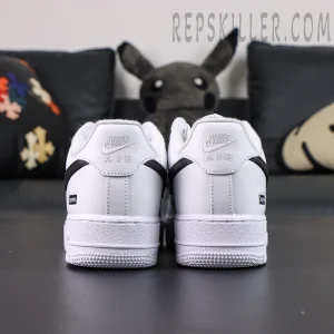 Rear heel close-up of Supreme x Nike Air Force 1 Low SP ‘Box Logo - White Black’ with dual Nike and Supreme branding