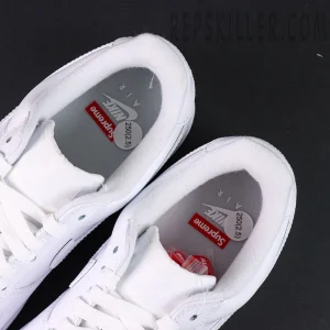 Top view of Supreme x Nike Air Force 1 Low SP ‘Box Logo - White’ showing Nike Air and Supreme co-branded insoles