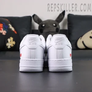 Back view of Supreme x Nike Air Force 1 Low SP ‘Box Logo - White’ with minimal branding and clean stitching