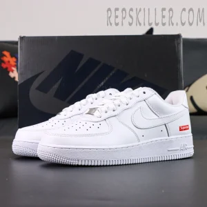 Supreme x Nike Air Force 1 Low SP ‘Box Logo - White’ with Nike shoebox backdrop, highlighting sleek all-white finish