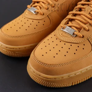 Sup x Air Force 1 Low SP ‘Box Logo - Wheat’ toe box close-up showing nubuck texture and perforations