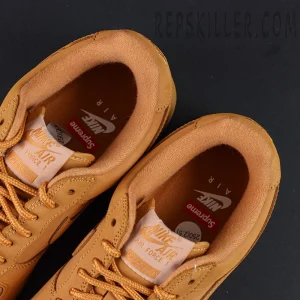Top view of Sup x Air Force 1 Low SP ‘Box Logo - Wheat’ showing Nike Air and Supreme dual branding on insoles