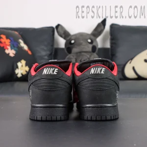 Nike Supreme x Dunk Low SB “Black” rear view highlighting embroidered Nike logo and red collar lining.