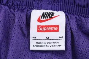 Sup x Nike Swoosh Track Pants Purple Wash label