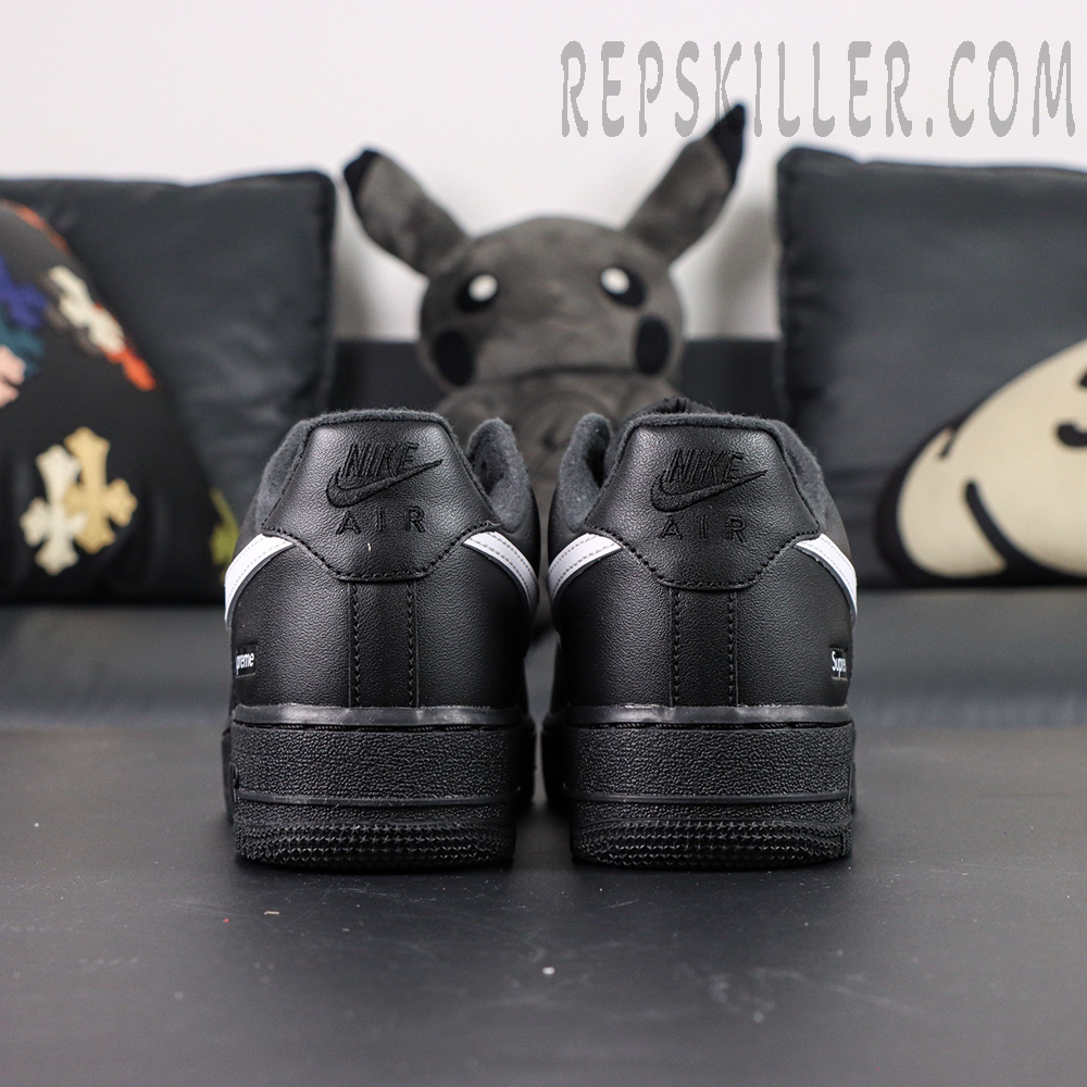 Rear heel view of Supreme x Nike Air Force 1 Low SP ‘Box Logo - Black White’ with embossed Nike Air and tonal stitching