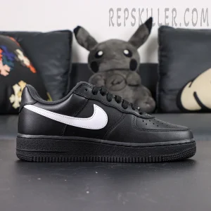 Lateral side profile of Supreme x Nike Air Force 1 Low SP ‘Box Logo - Black White’ featuring bold white swoosh and black midsole