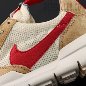 Close-up view of the red suede Nike Swoosh on the Tom Sachs x NikeCraft Mars Yard 2.0 upper.