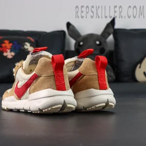 Mars Yard 2.0 heel view showing red pull tabs and suede panels