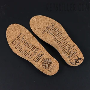 Pair of cork insoles with Tom Sachs-style scientific graphic prints.