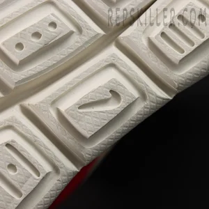 Outsole close-up showing Nike logo embedded in the tread.