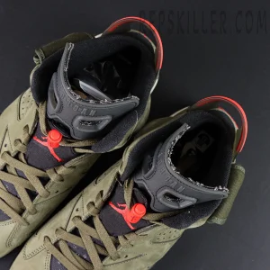 Top view of Travis Scott x Air Jordan 6 “Olive” showing lace system, Jumpman logo, and inner padding.