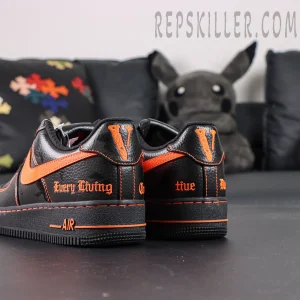 Angled rear view of Vlone x NikeLab Air Force 1 “Vlone” showing detailed heel embroidery and orange stitching.