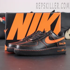 Pair of Vlone x NikeLab Air Force 1 “Vlone” with orange Nike box background emphasizing contrast color design.