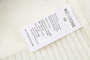 We11done Pocket Hem “W” Cardigan White Wash label