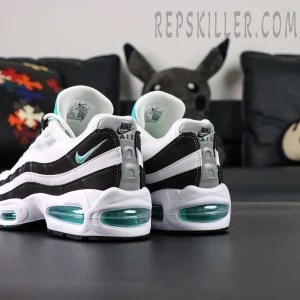 Back angle of Nike Air Max 95 OG Black Border highlighting layered suede stripes and teal mini Swoosh