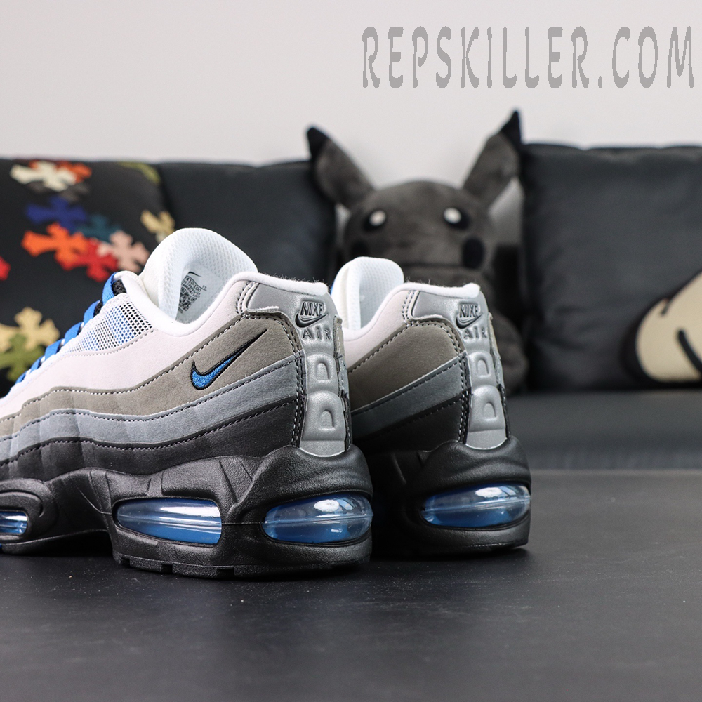 45-degree heel view of the Air Max 95 OG ‘Blue Spark’ highlighting the blue mini Swoosh and layered gradient panels