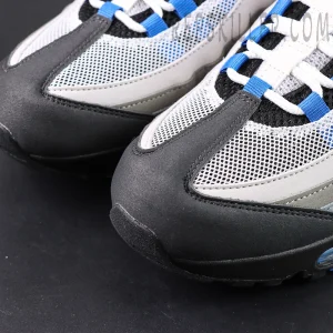 Close-up of the Air Max 95 OG ‘Blue Spark’ toe area showing mesh ventilation and protective overlay materials