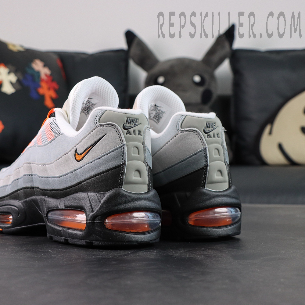 Rear angled view of Air Max 95 Bright Mandarin showing orange Air bubble