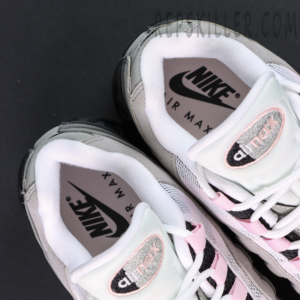Close-up of Nike Air Max 95 OG ‘Pink Foam’ insoles showing black Nike Air Max branding.