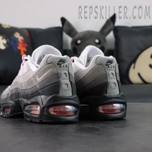 Angled heel view of Nike Air Max 95 OG ‘Pink Foam’ with soft pink mini Swoosh and Air cushioning.