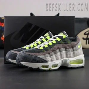 Nike Air Max 95 OG Reverse Neon side profile with shoe box, showcasing layered suede panels and visible neon Air unit.