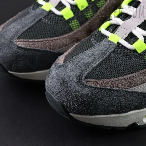 Nike Air Max 95 OG Reverse Neon close-up of suede toebox showing rough-cut material texture and mesh upper.