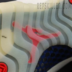 Close-up of the translucent outsole on the Jordan 11 Retro ‘285’ revealing the red Jumpman logo underneath.